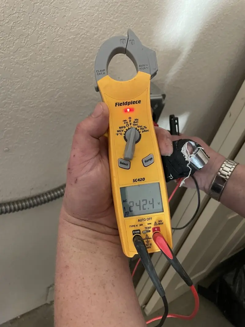 Voltage testing with clamp meter during Recessed Lighting Installation in Ocean Pines